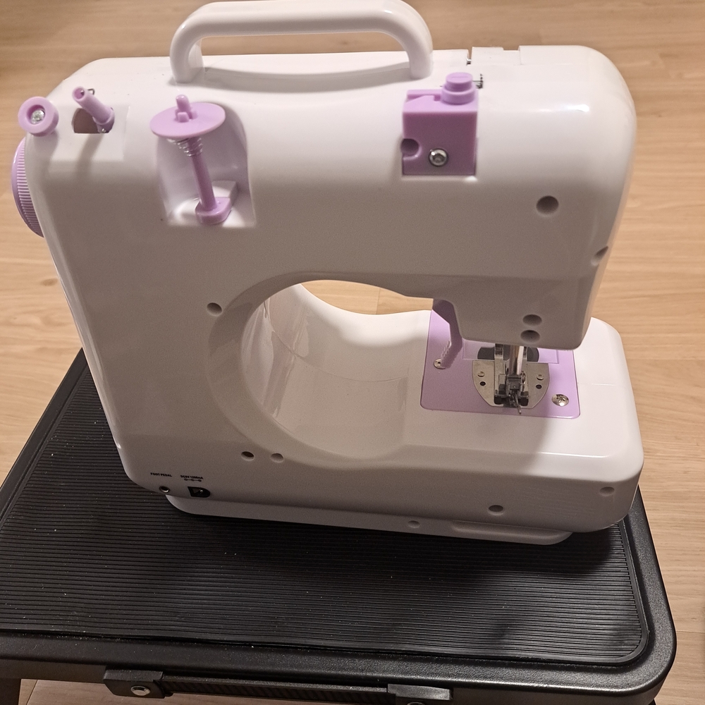 Compact White and Lavender Portable Sewing Machine - Picture 2 of 11